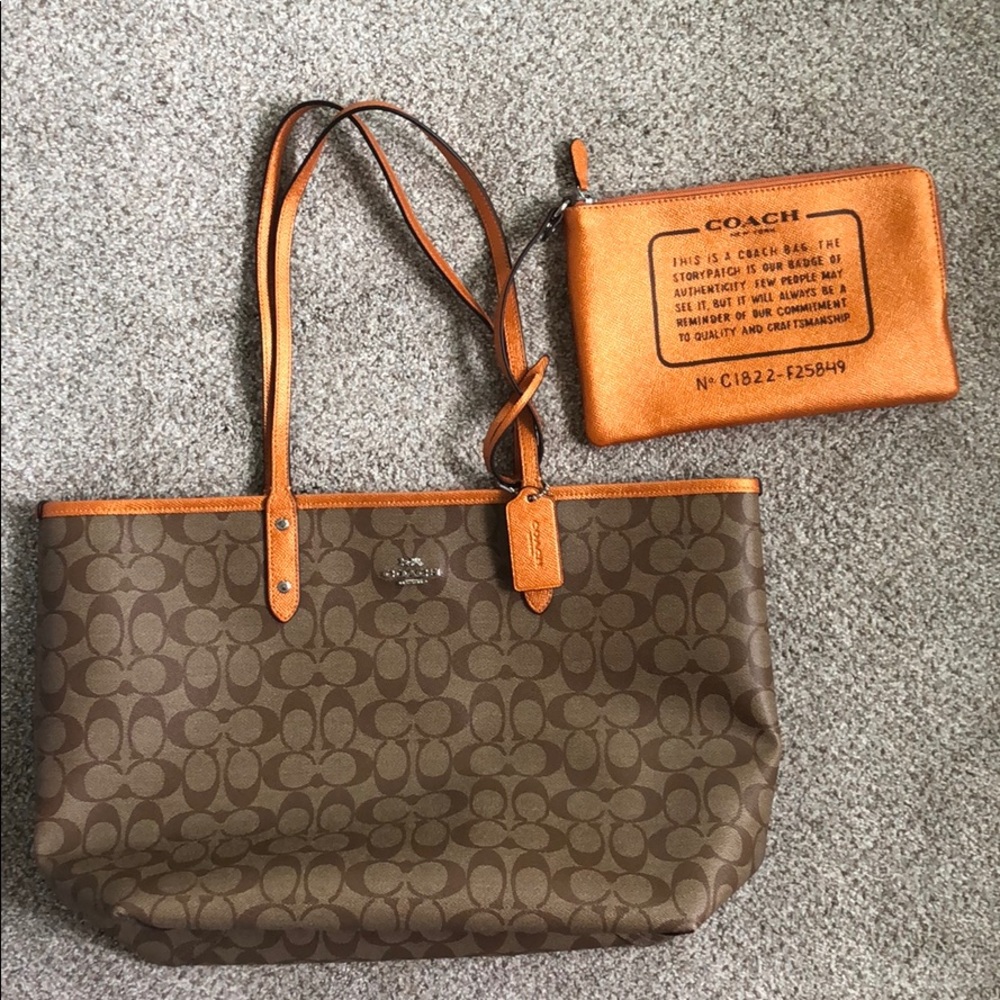 Coach Reversible tote in signature and orange